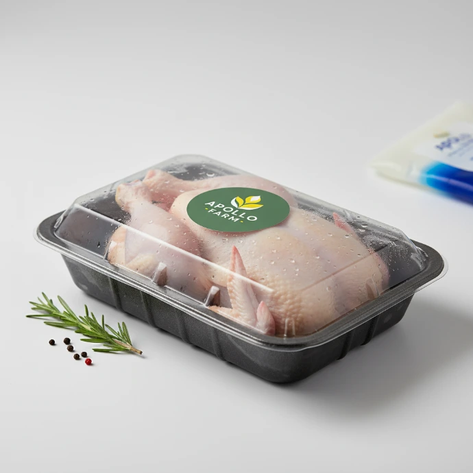 AI Generated Apollo Farm logo on fresh chicken packaging mockup